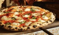 Pizza from Roberta's (Image via Instagram/@robertaspizza)
